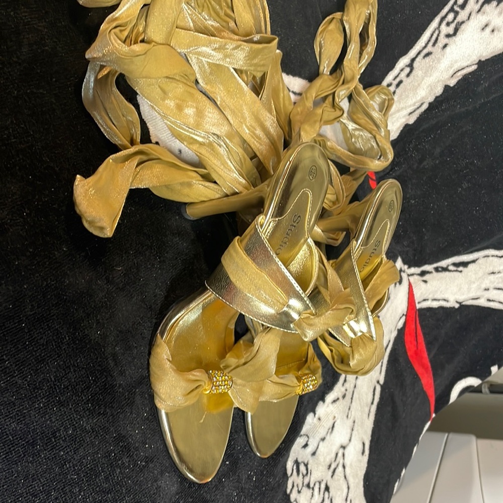 Gold ribbon lace up shoes